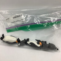 Bag of Penguin Figurines