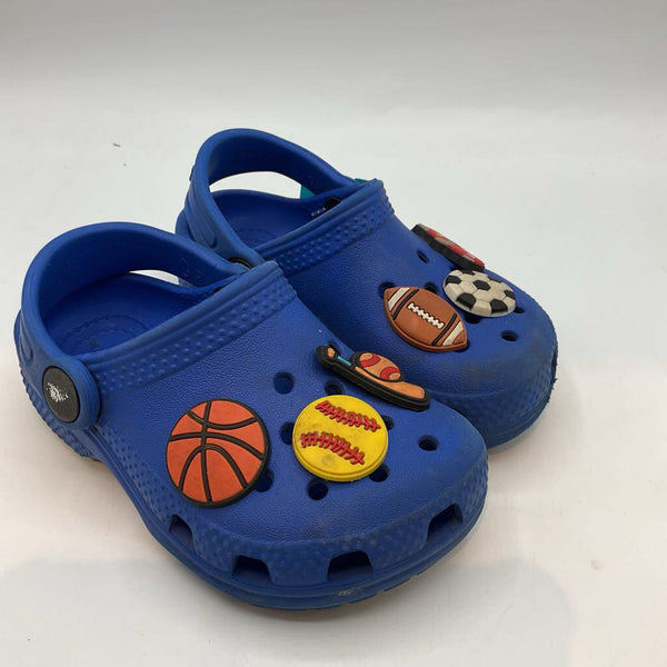 Size 7: Crocs Blue Clogs w/ Jibbitz