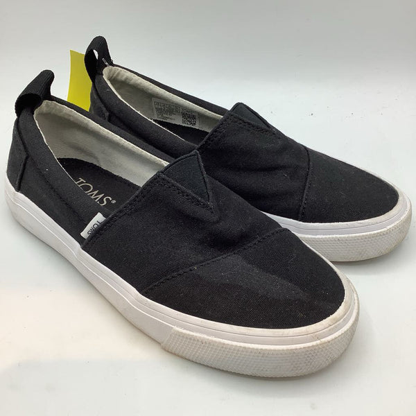 Size 1Y: Toms Black/White Slip-On Sneakers