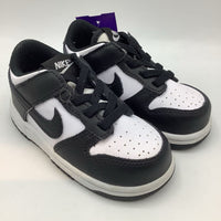 Size 7: Nike Black/White Pull-On Sneakers